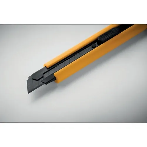 Cúter retráctil grande blade con cuchillas de repuesto ref MO2769 - Amarillo Item Detail Picture