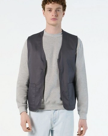 Chaleco unisex con cremallera y bolsillos prácticos