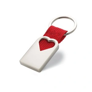 Llavero corazón metal efecto perla tira roja